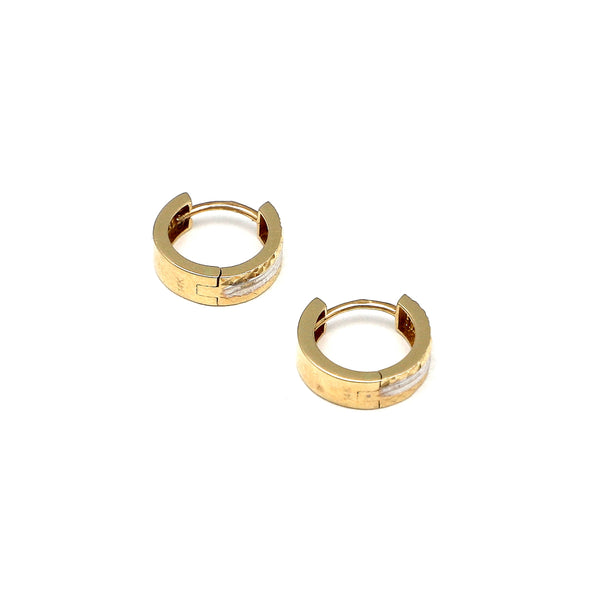 Arracadas articuladas facetadas en oro amarillo 14 kilates.