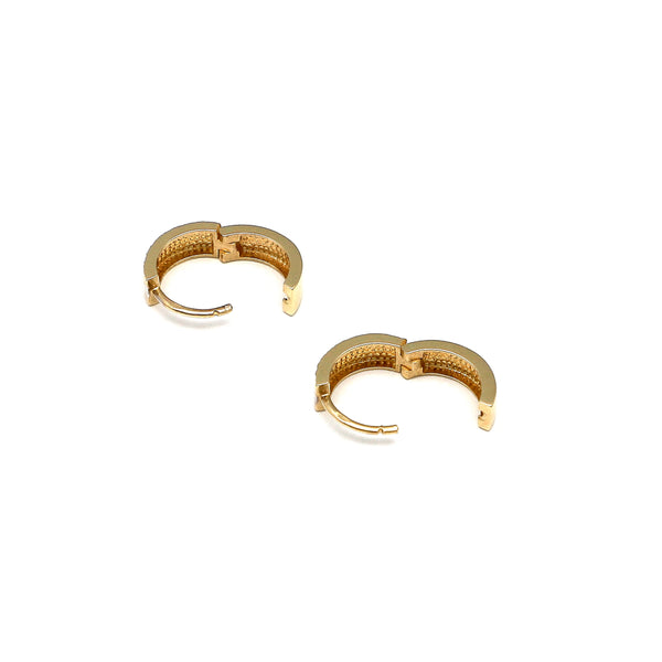 Arracadas articuladas facetadas en oro amarillo 14 kilates.