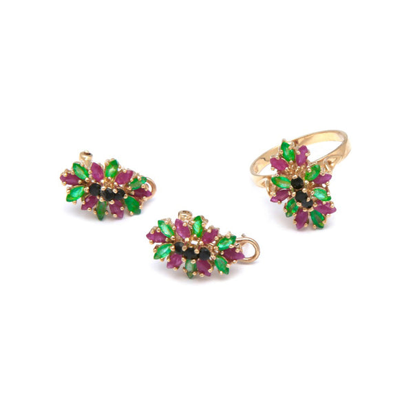 Juego de anillo y aretes diseño especial con gemas en oro amarillo 14 kilates.