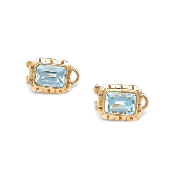 Aretes calados con sky blue en oro amarillo 14 kilates.