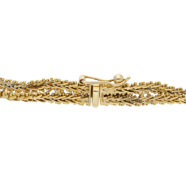 Pulsera eslabón boleado en oro amarillo 14 kilates.