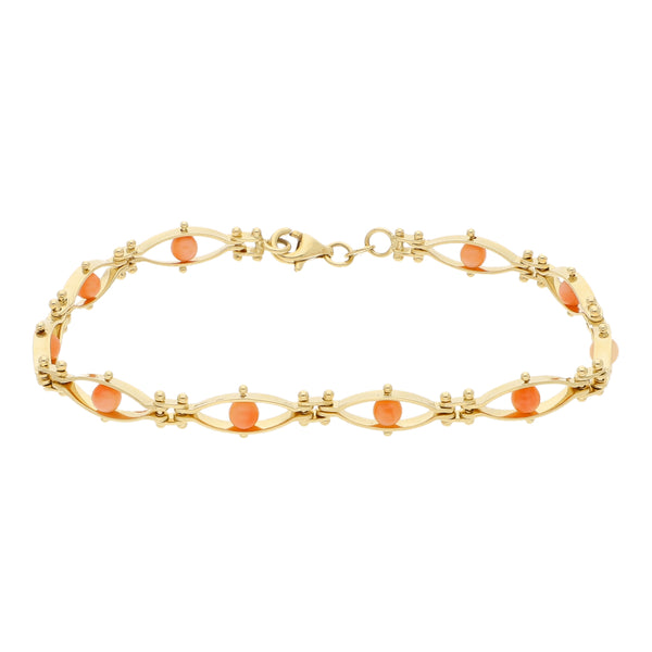 Pulsera eslabón combinado con coral en oro amarillo 14 kilates.