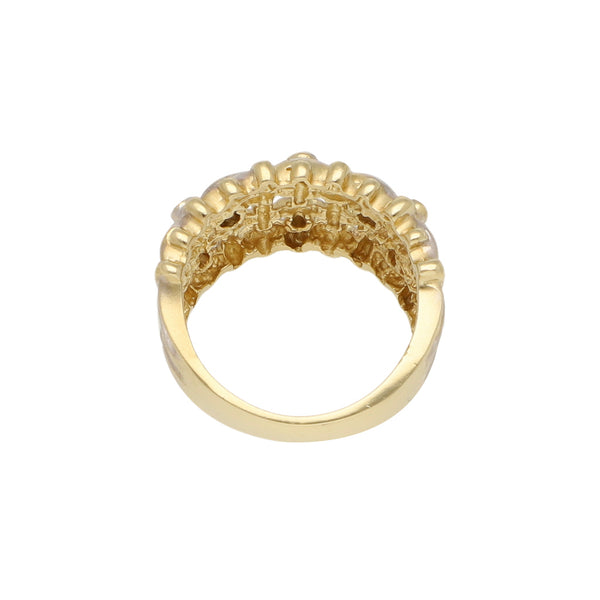 Anillo tejido con sinteticos en oro amarillo 14 kilates.