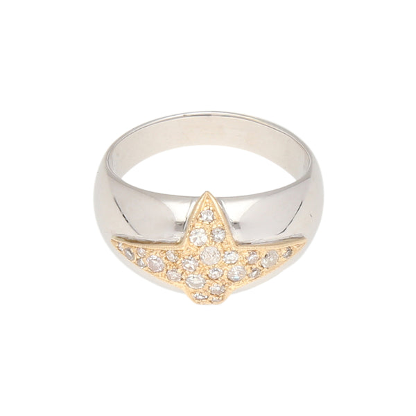 Anillo diseño especial motivo estrella con diamantes en oro dos tonos 14 kilates.