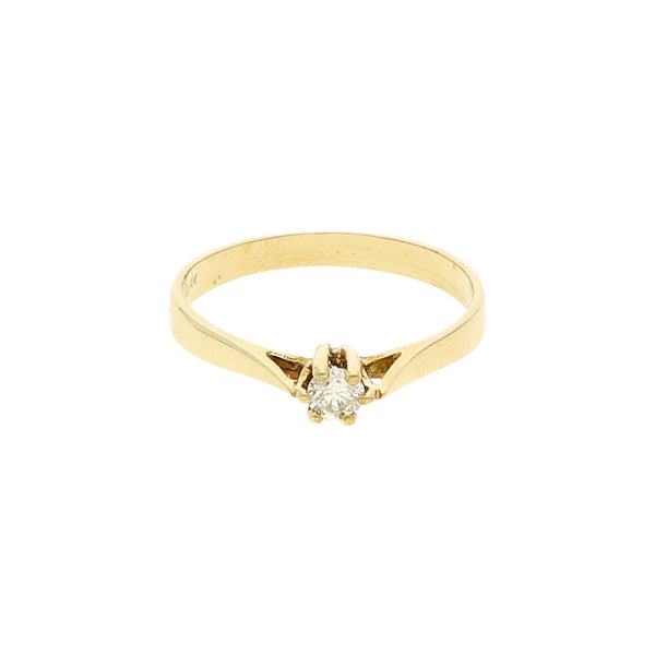 Anillo solitario con diamante en oro amarillo 14 kilates.