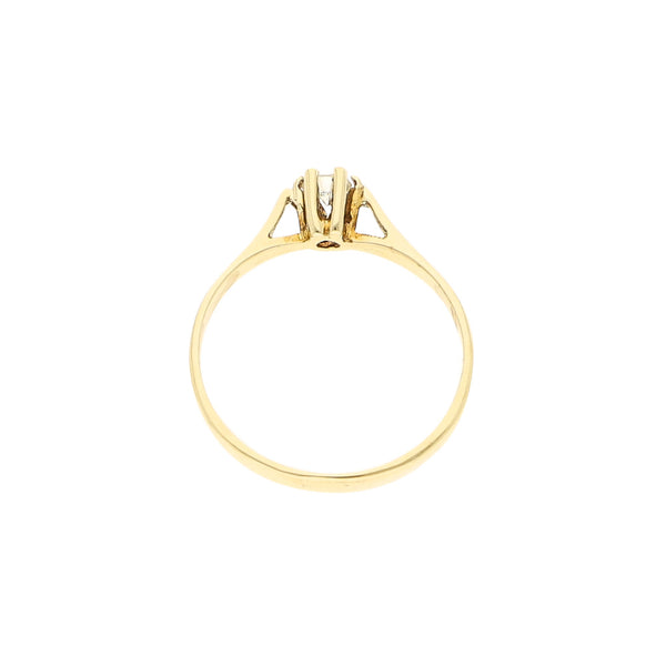 Anillo solitario con diamante en oro amarillo 14 kilates.