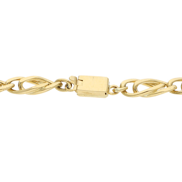 Pulsera eslabón nudo egipcio en oro amarillo 18 kilates.