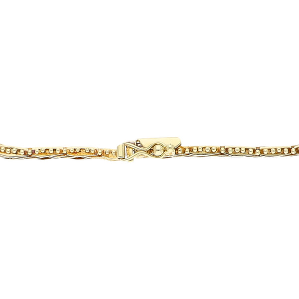 Pulsera eslabón boleado en oro amarillo 14 kilates.