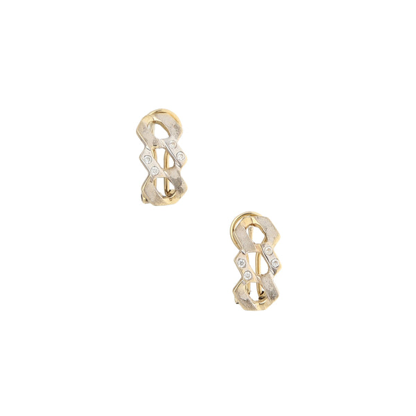 Aretes calados con circonias en oro amarillo 14 kilates.