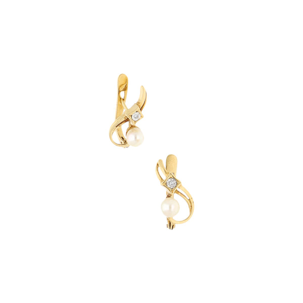 Aretes diseño especial con diamantes y perlas en oro amarillo 18 kilates.