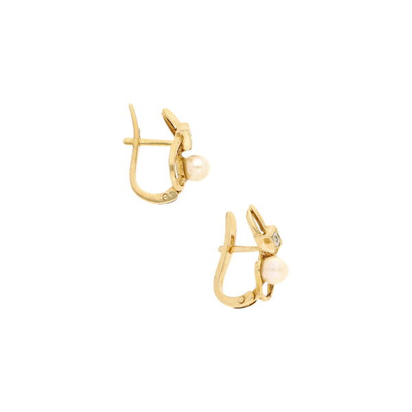 Aretes diseño especial con diamantes y perlas en oro amarillo 18 kilates.