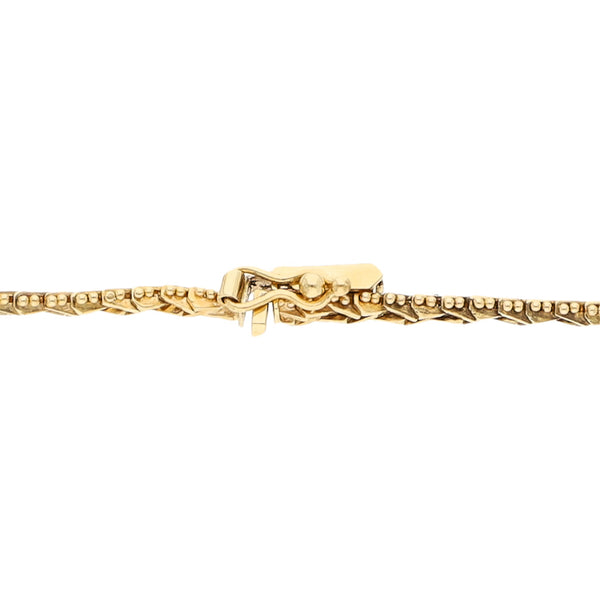 Pulsera eslabón boleado en oro amarillo 14 kilates.