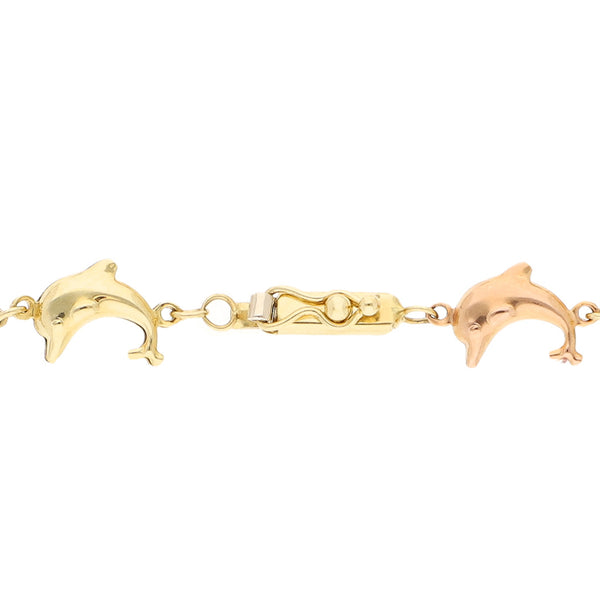 Pulsera eslabón articulado motivo delfines en oro tres tonos 14 kilates.