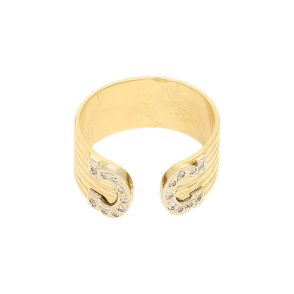 Anillo abierto con diamantes en oro amarillo 18 kilates.