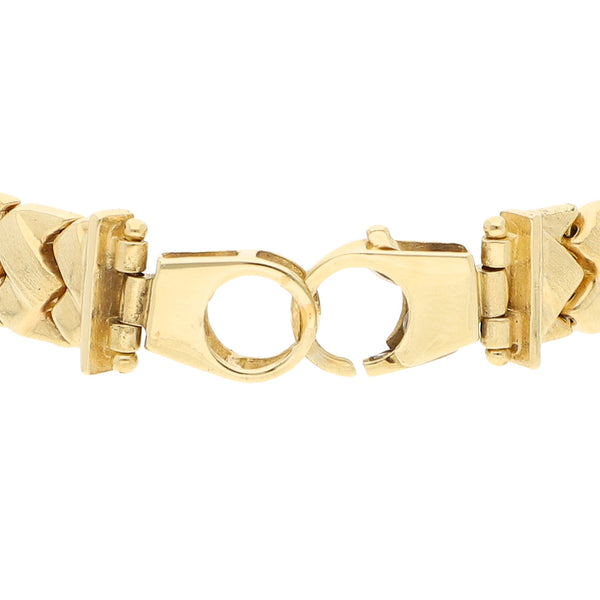 Pulsera eslabón trenzado en oro amarillo 14 kilates.