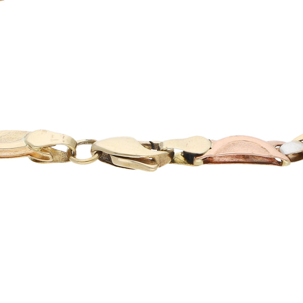 Pulsera eslabón laminado en oro tres tonos 14 kilates.