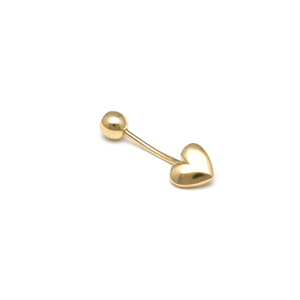 Piercing hueco motivo corazón con circonia en oro amarillo 14 kilates.