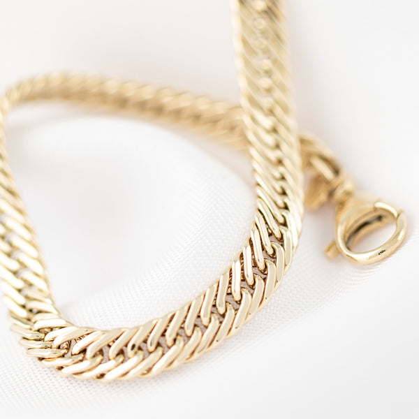 Pulsera eslabón encontrado doble en oro amarillo 14 kilates.