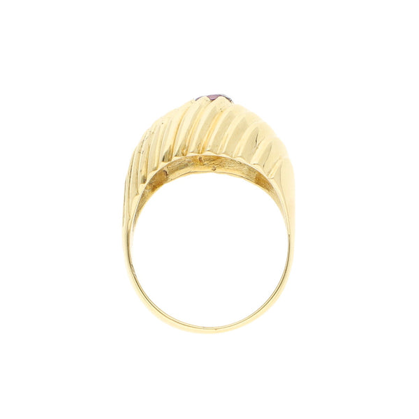 Anillo laminado con sintetico en oro amarillo 14 kilates.