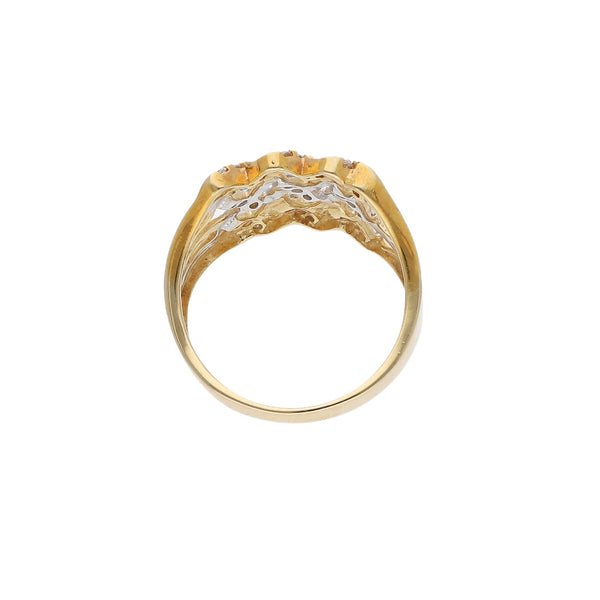 Anillo calado con circonias en oro amarillo 14 kilates.