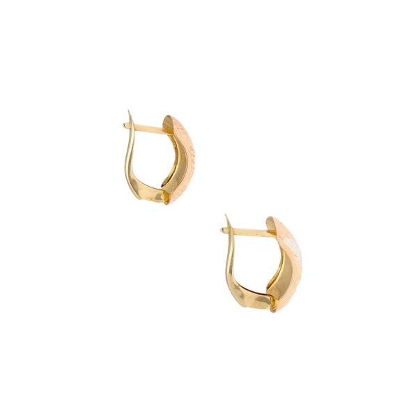 Aretes laminados en oro amarillo 14 kilates.