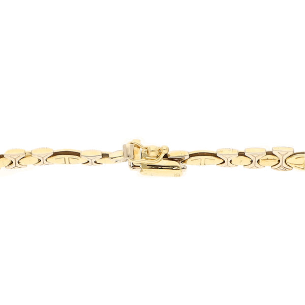 Pulsera eslabón articulado platinado en oro amarillo 14 kilates.