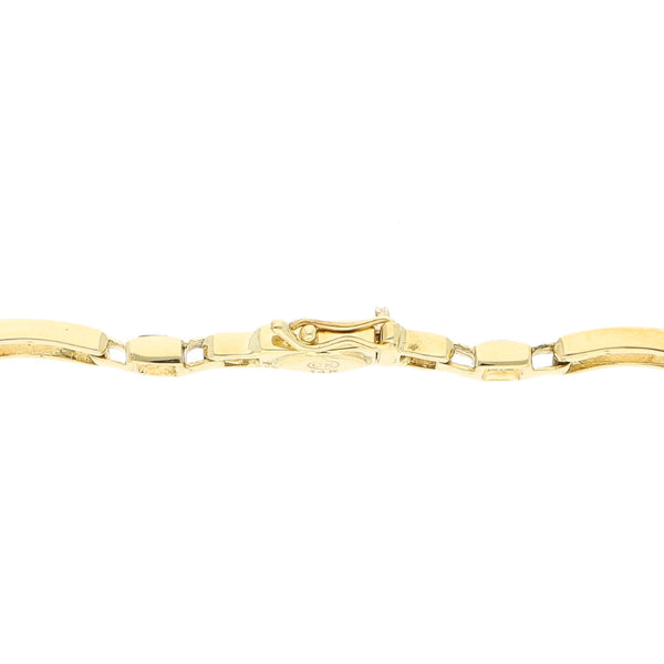 Pulsera eslabón articulado con sintéticos en oro amarillo 14 kilates.