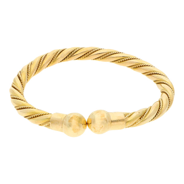 Pulsera de arillo trenzada en oro amarillo 16 kilates.