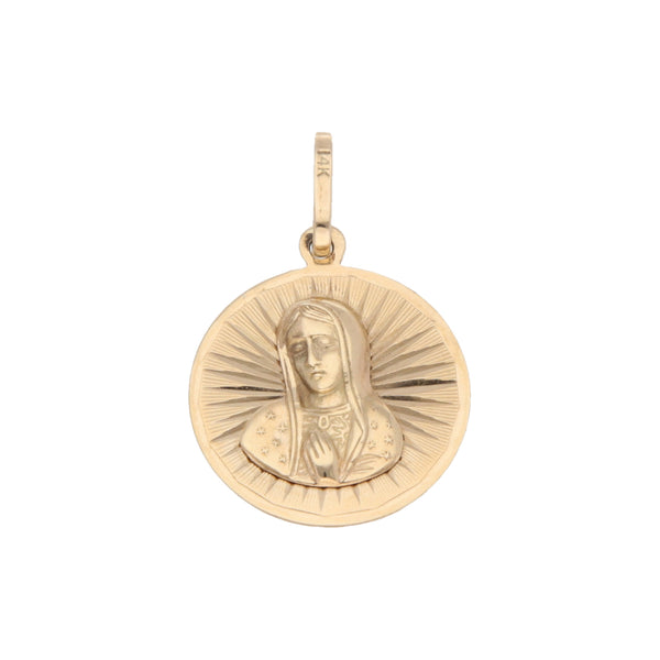 Medalla laminada motivo Virgen de Guadalupe en oro amarillo 14 kilates.