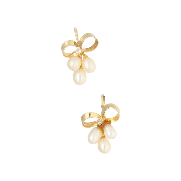 Aretes diseño especial con perlas y circonias en oro amarillo 14 kilates.