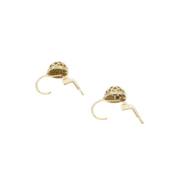 Aretes calados en oro amarillo 14 kilates.