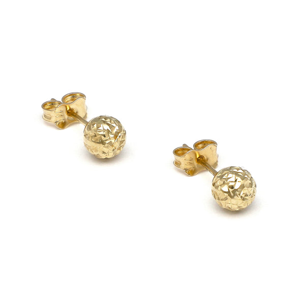 Aretes facetados en oro amarillo 14 kilates.