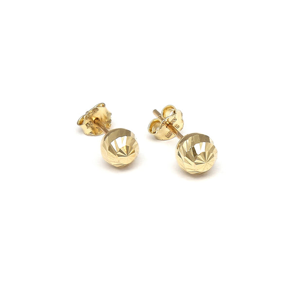 Aretes huecos motivo esferas en oro amarillo 14 kilates.