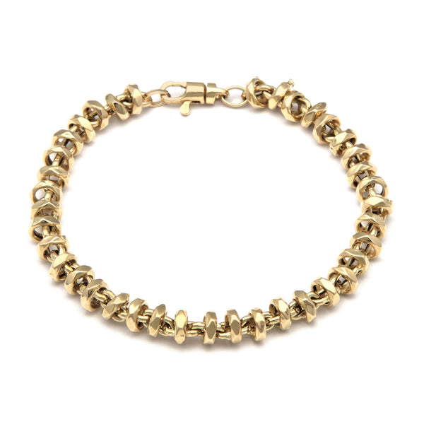 Pulsera eslabón combinado en oro amarillo 14 kilates.