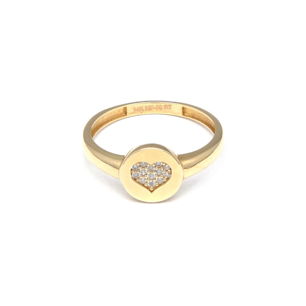 Anillo hueco motivo corazón con circonias en oro amarillo 14 kilates.