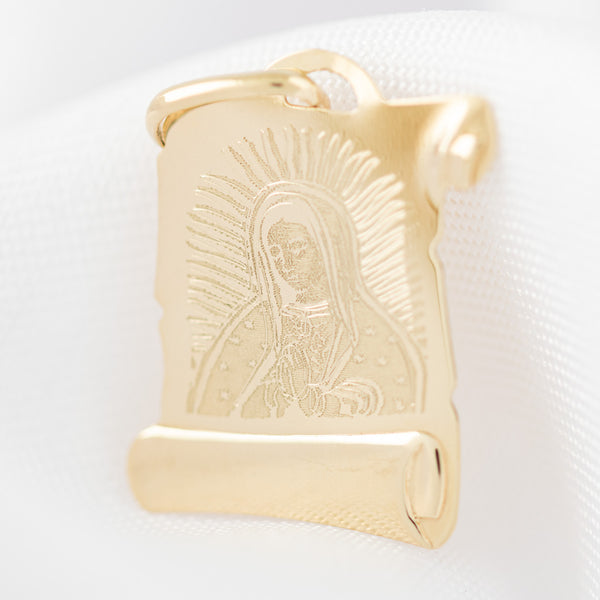 Medalla imagen sencilla motivo Virgen de Guadalupe en oro amarillo 14 kilates.