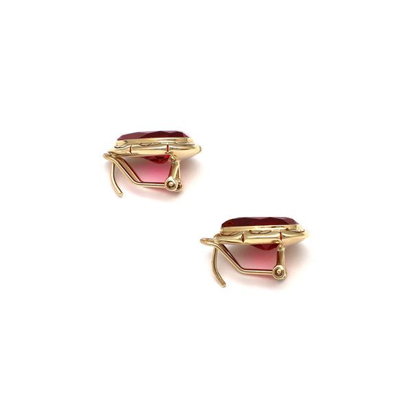 Aretes calados con rubies en oro amarillo 14 kilates.