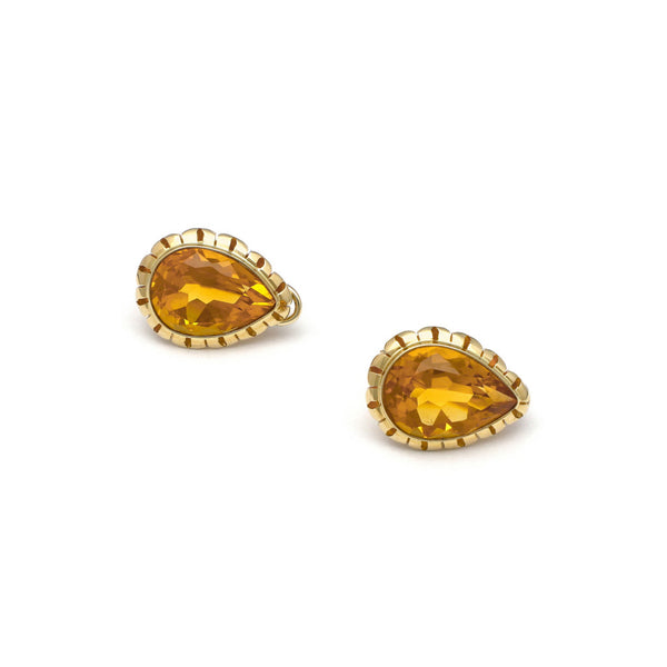 Aretes calados con citrinos en oro amarillo 14 kilates.