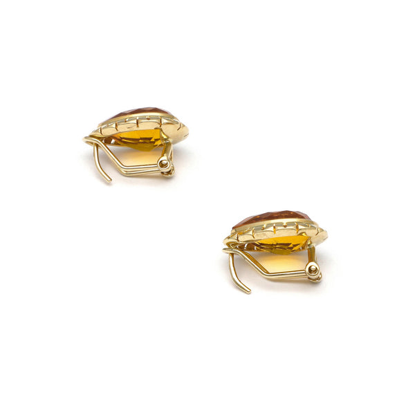 Aretes calados con citrinos en oro amarillo 14 kilates.