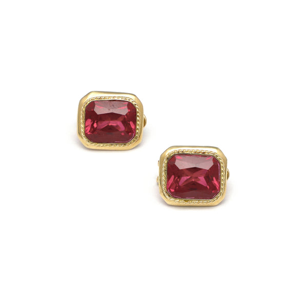 Aretes diseño especial con rubies en oro amarillo 14 kilates.