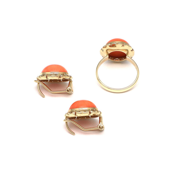 Juego de anillo y aretes calados con coral en oro amarillo 14 kilates.