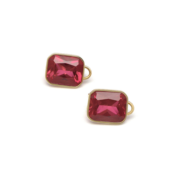 Aretes diseño especial con rubies en oro amarillo 14 kilates.