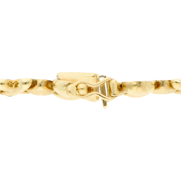 Pulsera eslabón combinado en oro amarillo 14 kilates.