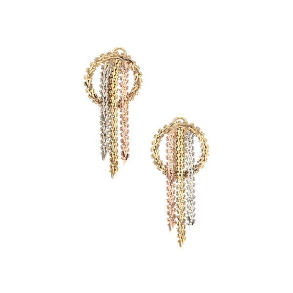 Aretes boleados en oro tres tonos 14 kilates.