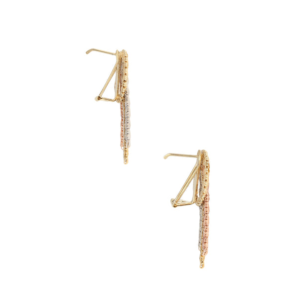 Aretes boleados en oro tres tonos 14 kilates.