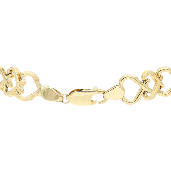 Pulsera eslabón articulado motivo corazones en oro amarillo 14 kilates.