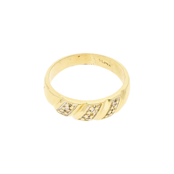 Anillo diseño especial con sintéticos en oro amarillo 14 kilates.