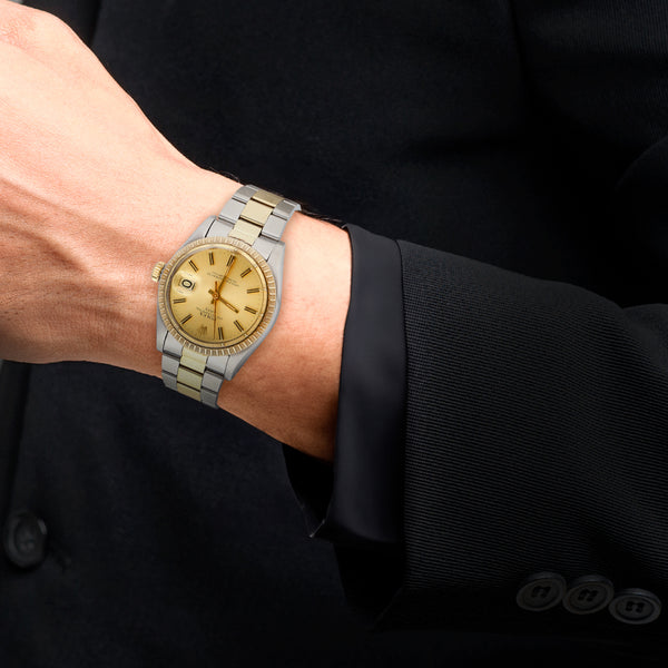 Reloj Rolex para caballero modelo Oyster Perpetual Date vistas oro amarillo 14 kilates.