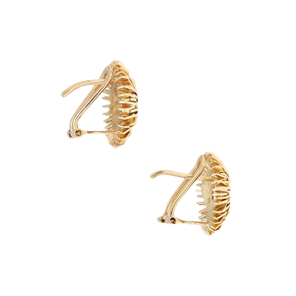 Aretes diseño especial en oro amarillo 18 kilates.