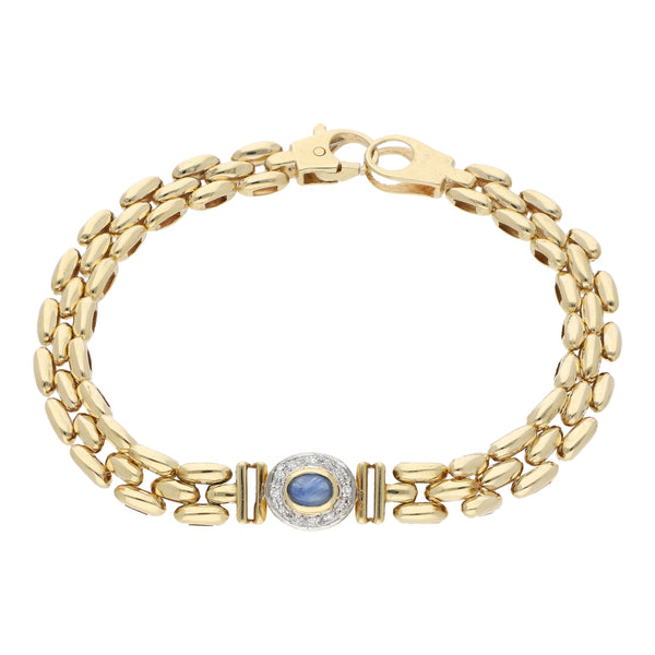 Pulsera eslabón articulado con aplicación, sintético y diamantes en oro amarillo 14 kilates.